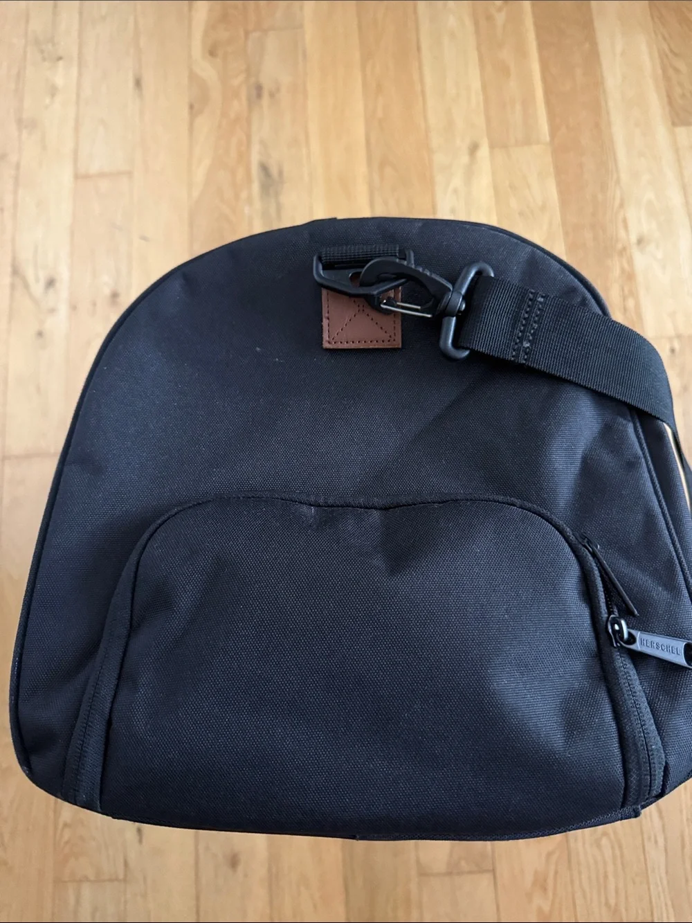 Herschel Supply Company Black Duffel with Brown Straps and White Piping. 43L.